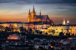 The illuminated, famous Castle of Prague, Czech Republic, situated over the old town just after sunset time