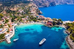Aerial view of the little village of Assos on the island of Kefalonia, Greece, with emerald, calm sea