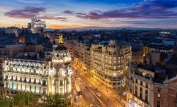 The Skyline of Madrid, Spain, by night: where Gran Via and Alcala Street meet