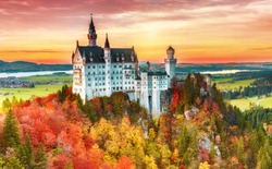 Beautiful aerial view of Neuschwanstein castle in autumn season. Palace situated in Bavaria, Germany. Neuschwanstein castle one of the most popular palace and travel destination in Europe and world.