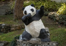Statue of a panda doing a dab dance in Chiang Mai Zoo