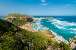 Robberg nature reserve near Plettenberg bay, Garden Route. Wonderful beach and indian ocean waves from above. Robberg peninsula, South african landscape, South Africa, Garden route wilderness 