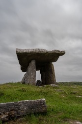 A long exposure view of the Poulnabrone Dolmen under an overcast sky in County Clare of Western Ireland