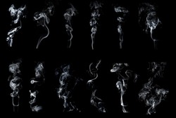 Set of soft white smoke in the black background.