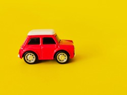 Close​ up​ car on yellow background