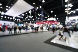 Blur, defocused background of public exhibition hall. Business tradeshow, job fair, or stock market. Organization or company event, commercial trading, or shopping mall marketing advertisement concept