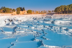 One of the main tourist attractions in Turkey is the travertines and Pamukkale hot springs. Scenic panoramic view on turkish resort