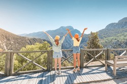 two girls friends take in the stunning mountain scenery together in Taurus mountains