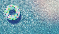 float ring with pink pineapple pattern on pool water and space for text. 3d render