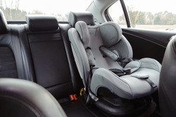 Child car seat for safety in the rear passenger seat of a car.