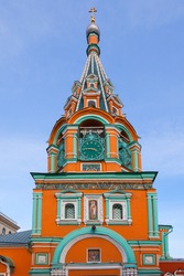 The bell tower with the clock tower of the Church of Gregory of Neocaesarea in Moscow