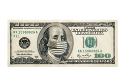Concept, one hundred dollars with Benjamin Franklin masked by a virus. Coronavirus protection.
