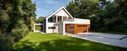 Panorama of beautiful and modern house among trees, exterior view