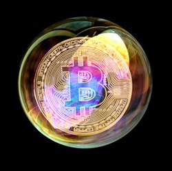 Bitcoin coin in a soap bubble. Concept of instability of the crypto currency over black background.