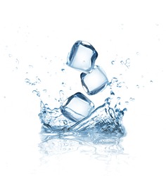 Ice cubes splashing into water over white