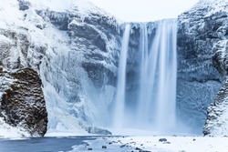 Beautiful Skogafoss waterfall. Iceland. Winter view.