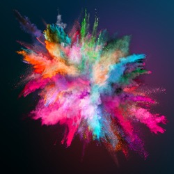 Colored powder explosion on dark gradient background. Freeze motion.