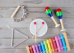 frame made of music accessories for children on white background