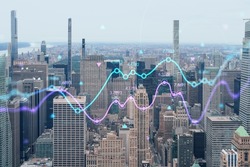 Aerial panoramic city view of Upper Manhattan and Central Park, New York city, USA. Iconic skyscrapers of NYC. Forex candlestick graph hologram. The concept of internet trading, brokerage, analysis