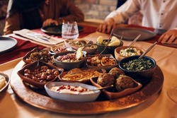 Variety of Arabian food during traditional Iftar meal on Ramadan.