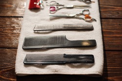 hairdressing tools on a towel - scissors, combs, clipper