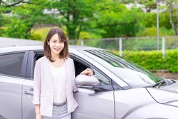 A young woman who bought her own car