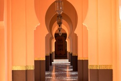 Perspective of orange corridor walkway  with the lamp