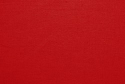Red cotton fabric texture background, seamless pattern of natural textile.