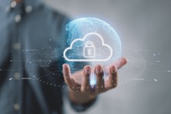 Cloud computing technology database storage security concept Backup transfer. There is a large cloud icon on the right in an abstract world on businessman.