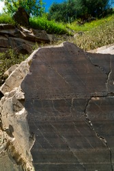 Engravings in Archaeological site of Piscos valley with paleolithic rock art open-air paintings within Côa Valley in northern Portugal in Europe