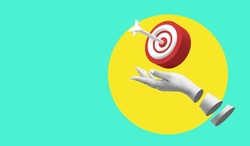 Art collage digital pop modern art.AI Hand holding target goal aim strategy success business competition achievement marketing.aim goal, increase motivation, a way to achieve a goal idea.marketing.hit