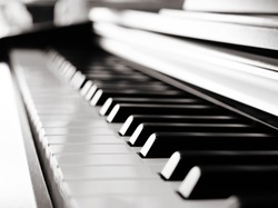 Black piano close up blur background and foreground