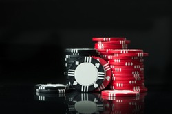 Stacks of poker chips isolated on black background