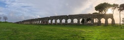 Ruins of Roman aqueduct Aqua Claudia in Parco degli Acquedotti park, Rome, Italy