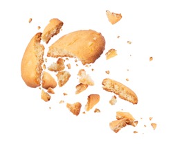 Biscuits crumbles into pieces close-up isolated on a white background