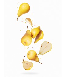Whole and sliced pears in the air isolated on a white background