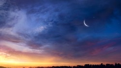  Crescent moon with beautiful sunset background . Generous Ramadan 