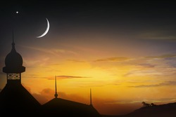 Beautiful sky . Mosque silhouette against the background of  sky.   Perfect sunset 