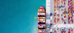 Aerial top view of International Containers Cargo ship in ocean, Freight Transportation,Shipping,Nautical Vessel. Logistics import export Container Cargo ship over sea. OverseaTransport business.