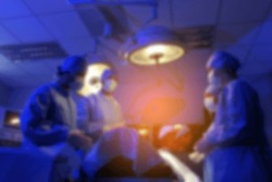 Blurred background of modern operating room at hospital. Operating room Doctor or Surgeon, Medical Team Performing Surgical Operation in Modern Operating Room.