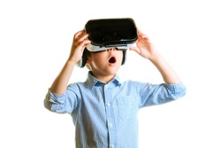 Children experiencing virtual reality isolated on white background. Surprised little boy looking in VR glasses. 