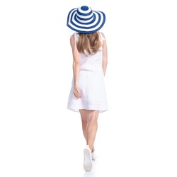 Woman in dress and summer hat goes walking on white background isolation, back view