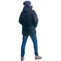 Man in winter jacket and warm hat standing looking on white background isolation, rear view