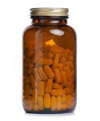 Glass jar of pills medicine health on white background isolation