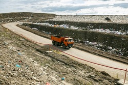 Terraces at the landfill. Arrival at the landfill of household waste.