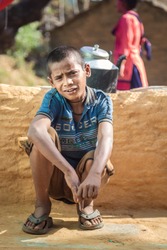 A portrait of a poor innocent Indian boy from a village