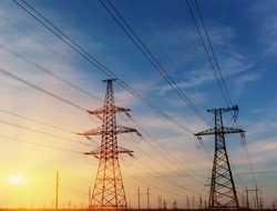 High voltage power electricity transmission pylon silhouette