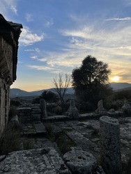 Sunrise over Aegean Sea Island Lesvos, with ancient temple