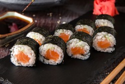 Maki rolls with salmon and cheese. Sushi menu. Japanese food. 