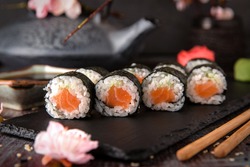 Maki rolls with salmon and cheese. Sushi menu. Japanese food.